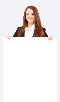 站在一塊空白板旁的一個商業(yè)婦女的隔離