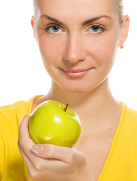 可愛的女孩與多汁的綠色蘋果