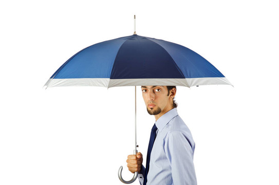 商人手里拿著雨傘在辦公室