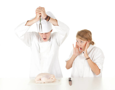 廚師團隊在白色制服準備生雞肉；系列
