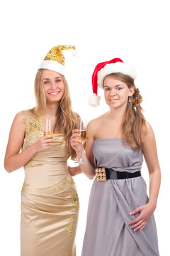 兩個女孩用手拿禮物和眼鏡慶祝圣誕節(jié)