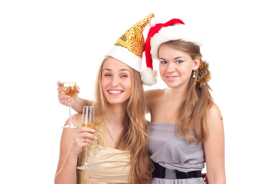 兩個(gè)女孩用手拿禮物和眼鏡慶祝圣誕節(jié)