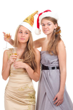 兩個女孩用手拿禮物和眼鏡慶祝圣誕節(jié)