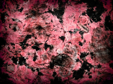 黑色和鮭魚彩色大理石表面紋理為背景