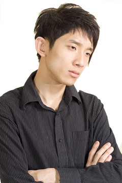 亞洲男人在思想上孤立的白色背景。