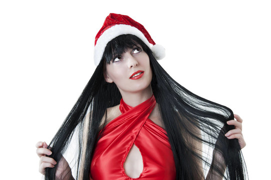 紅色的圣誕老人帽的女模特的肖像