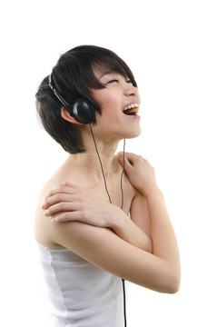 音樂(lè)。女人跳舞用耳塞