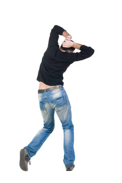 年輕人跳舞。后視圖。