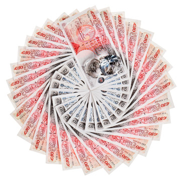 50多英鎊的鈔票鉆石散開；白色隔離