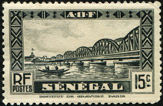 塞內(nèi)加爾-大約1935：一在塞內(nèi)加爾印刷郵票的鐵路橋橫跨河圣路易斯Louis Faidherbe；大