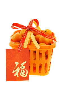 白色背景的橘子和春節(jié)紅包禮品籃