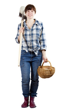 帶著鏟子和籃子的快樂女人