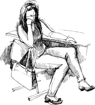 女孩后的一個(gè)學(xué)校課桌