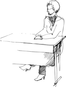 女孩后的一個(gè)學(xué)校課桌
