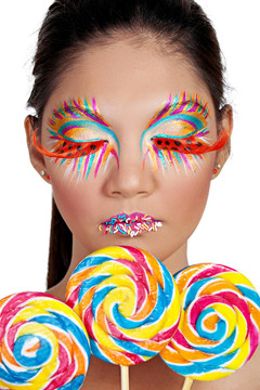 亞洲女性三彩色Lollipop