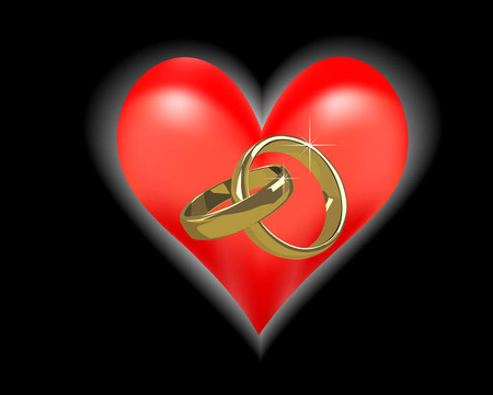 黃金結(jié)婚戒指在一個(gè)黑色的背景