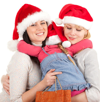 Santa紅帽子里的兩個女人和一個小女孩