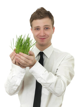 男子拿著一個小植物