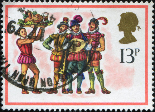 英國-大約1978：問候圣誕郵票印制在英國顯示的仆人應當伴隨著節(jié)日的餐桌的野豬頭卡羅爾音樂家；大約1