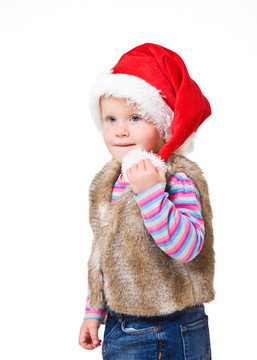 金發(fā)女孩的毛皮外套和紅色Santa的帽子