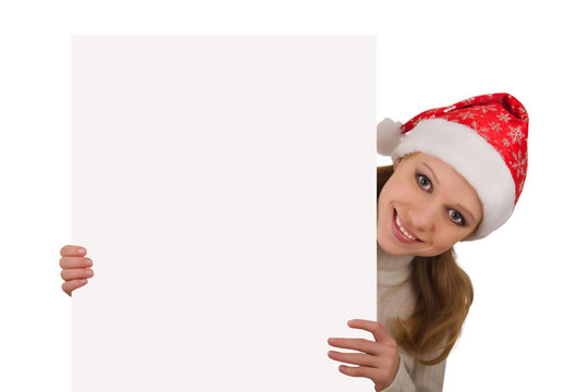 女孩在Santa的帽子抱著空板