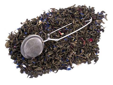 在白色背景和綠茶葉如意