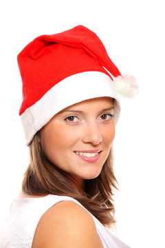 美麗的女孩在Santa的帽子