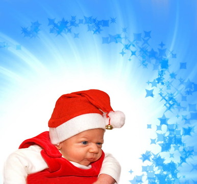 可愛的嬰兒在Santa的抽象背景西裝