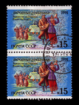USSR -大約1991：郵票印刷在USSR；顯示烏克蘭人跳舞在圣誕假期；晚上雪和小房子在樹；大約1