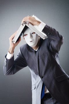 工業(yè)espionate概念與蒙面的商人