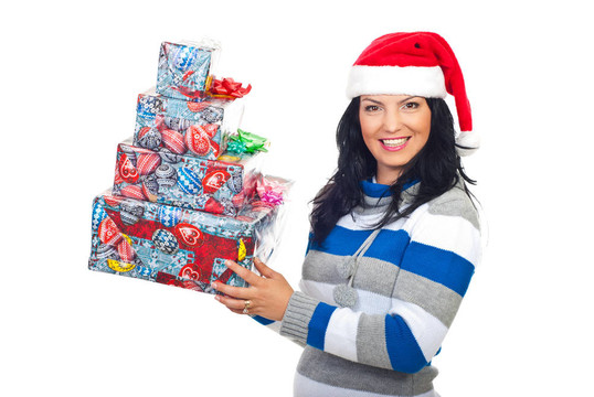 幸福的女人在Santa帽子的禮物