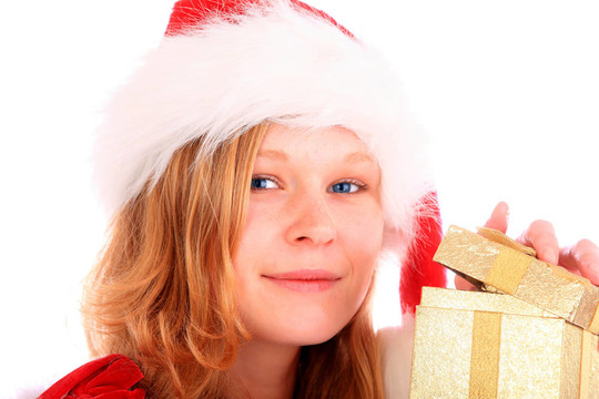 Santa小姐正在開一個金色的禮品盒
