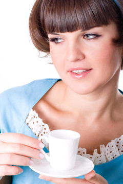 年輕的女人喜歡喝一杯咖啡