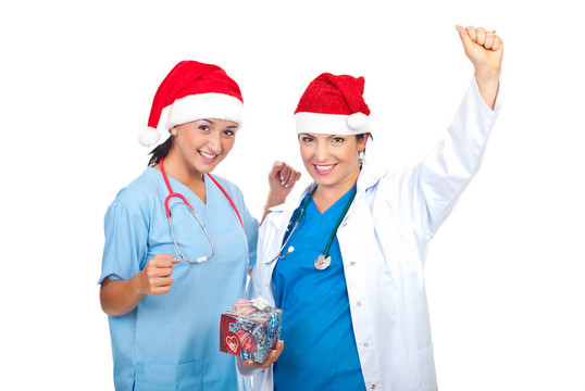 兩名醫(yī)生與Santa婦女帽子歡呼