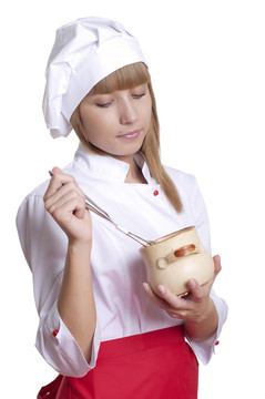 迷人的廚師女人一個(gè)白色的背景