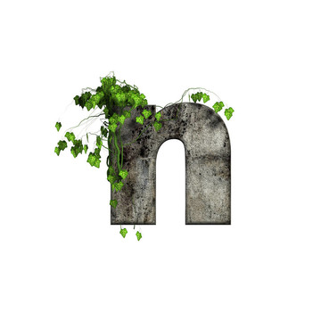 3D石字母上的綠色常春藤