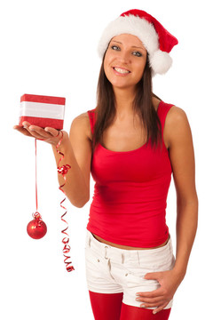 漂亮的女孩穿著像Santa的圣誕禮物