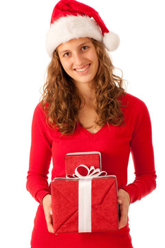 漂亮的女孩穿著像Santa的圣誕禮物