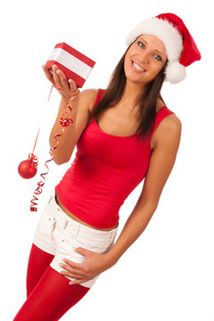 漂亮的女孩穿著像Santa的圣誕禮物