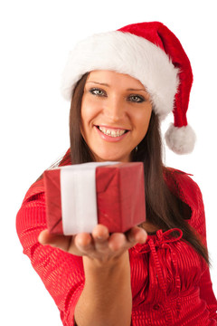 漂亮的女孩穿著像Santa的圣誕禮物