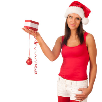 漂亮的女孩穿著像Santa的圣誕禮物
