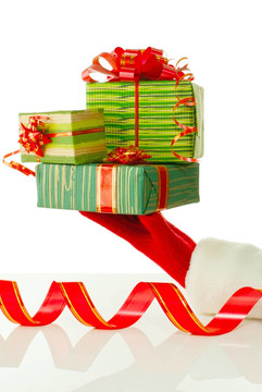 Santa手持白色背景圣誕禮物