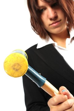 女孩用錘