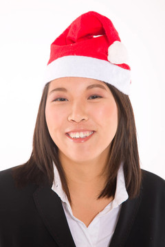 亞洲商人與圣誕老人的帽子