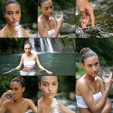 瀑布附近的年輕女子喝水