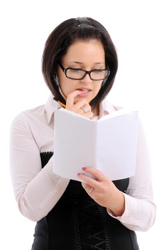 帶鉛筆和書的女人