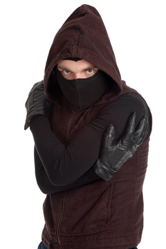 穿深色衣服的男盜賊；面具和頭巾