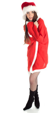 傷心的年輕女人穿著紅色的Santa衣服和帽子