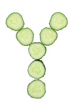 切碎黃瓜的蔬菜字母