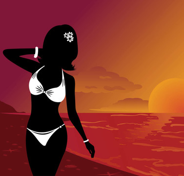 海灘上夕陽美麗女孩剪影